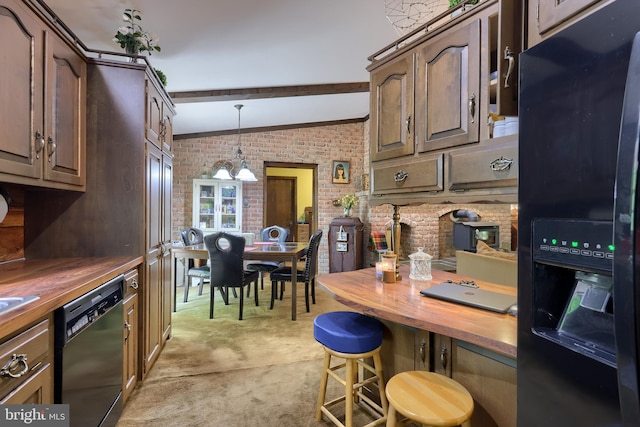 659 Lancaster Pike, New Providence, PA 17560 - kitchen featuring black appliances, brick wall, wood counters, light carpet, and a chandelier
