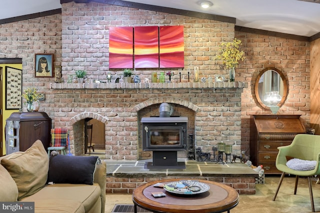 659 Lancaster Pike, New Providence, PA 17560 - carpeted living area featuring a wood stove and lofted ceiling