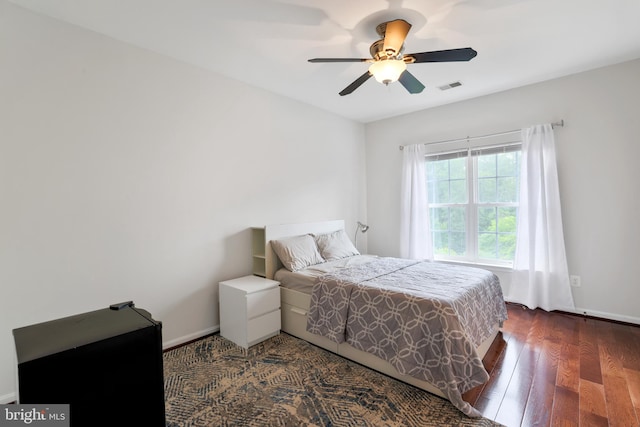 13626 Sylvan Bluff Dr, Leesburg, VA 20176 - bedroom with dark wood-style flooring and ceiling fan
