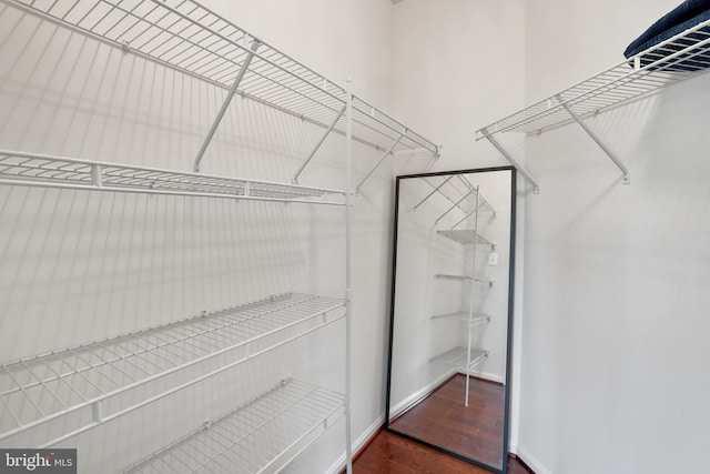 13626 Sylvan Bluff Dr, Leesburg, VA 20176 - walk in closet with wood finished floors