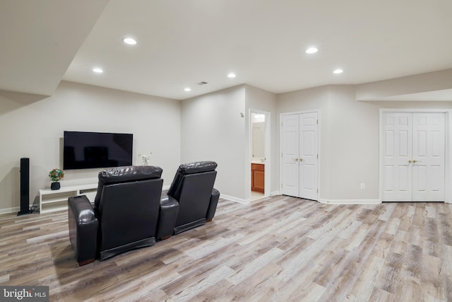 13626 Sylvan Bluff Dr, Leesburg, VA 20176 - living area featuring light wood-type flooring and recessed lighting