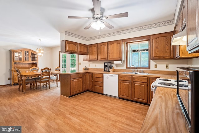 13245 Croom Rd, Upper Marlboro, MD 20772 - kitchen with dishwasher, brown cabinets, a sink, and healthy amount of natural light