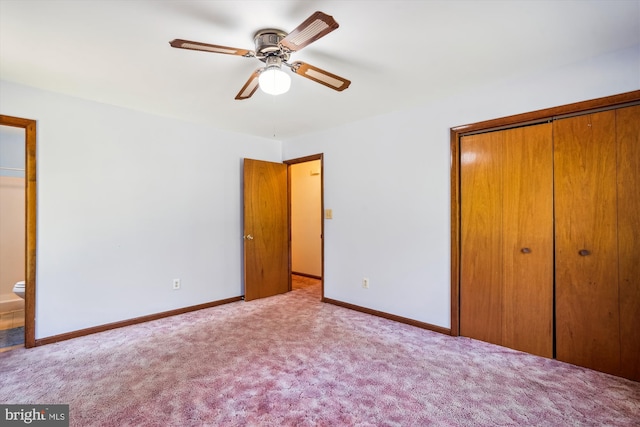 13245 Croom Rd, Upper Marlboro, MD 20772 - unfurnished bedroom featuring a closet, carpet floors, baseboards, ensuite bath, and ceiling fan