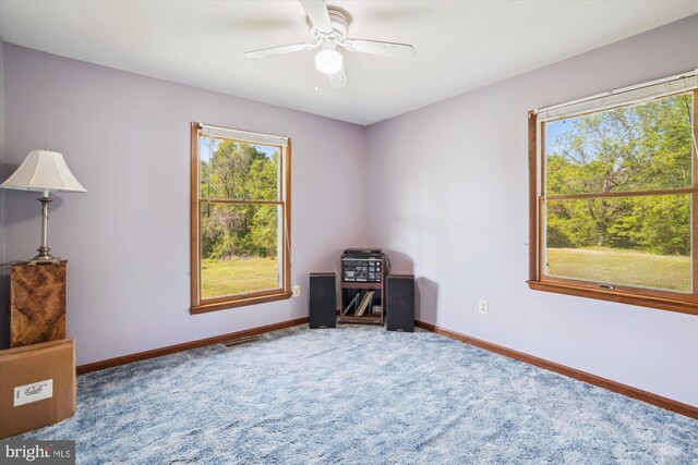 13245 Croom Rd, Upper Marlboro, MD 20772 - spare room featuring carpet, baseboards, and ceiling fan