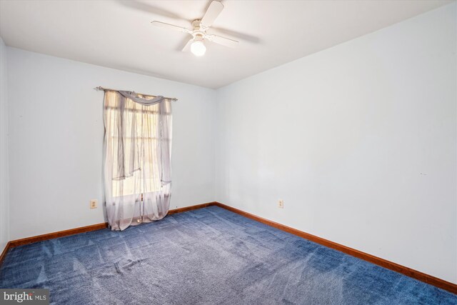 13245 Croom Rd, Upper Marlboro, MD 20772 - carpeted spare room with a ceiling fan and baseboards