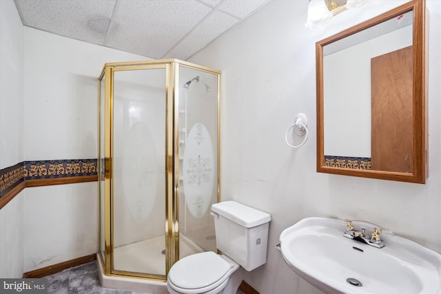 13245 Croom Rd, Upper Marlboro, MD 20772 - full bath with a sink, a shower stall, toilet, and a paneled ceiling