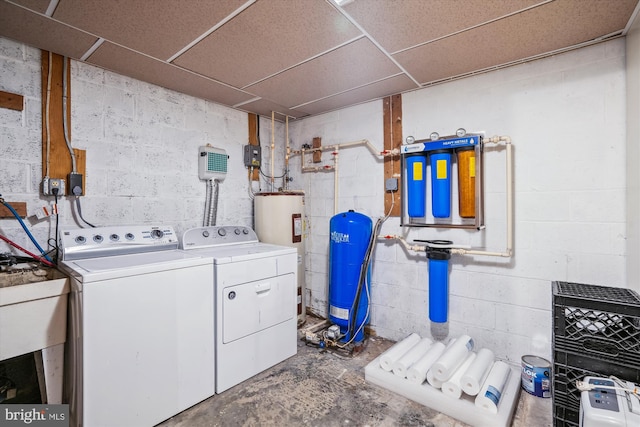 13245 Croom Rd, Upper Marlboro, MD 20772 - clothes washing area with electric water heater and independent washer and dryer