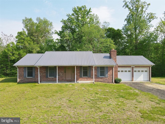 13245 Croom Rd, Upper Marlboro, MD 20772 - ranch-style home with a garage, a front yard, asphalt driveway, and a chimney