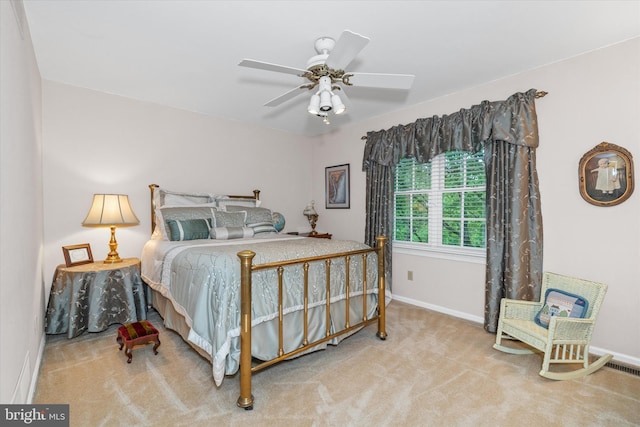carpeted bedroom featuring baseboards