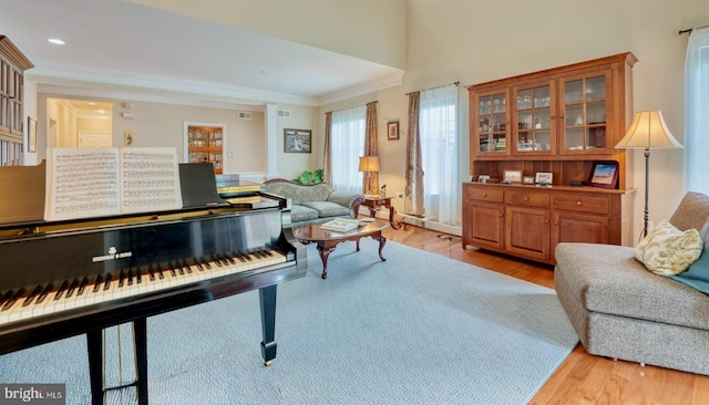 44458 Maltese Falcon Sq, Ashburn, VA 20147 - sitting room featuring light wood finished floors, ornamental molding, and recessed lighting