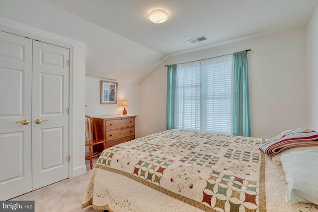 44458 Maltese Falcon Sq, Ashburn, VA 20147 - bedroom with vaulted ceiling, light carpet, and a closet