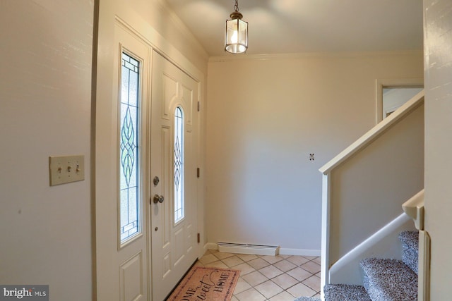 621 E Walnut St, Palmyra, PA 17078 - foyer featuring a baseboard heating unit, stairs, light tile patterned flooring, and ornamental molding