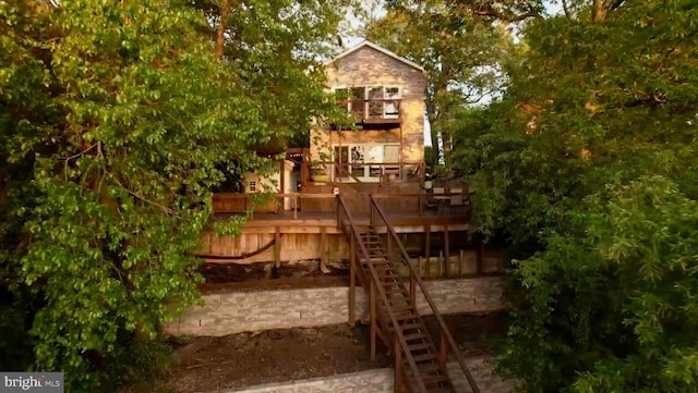 7674 Pine Knob Rd, Pasadena, MD 21122 - view of play area featuring stairway and a wooden deck
