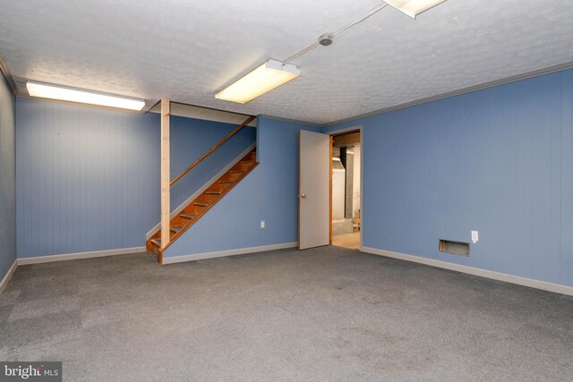 84 Transverse Unit 84, Middle River, MD 21220 - finished below grade area featuring a textured ceiling, stairs, carpet floors, and baseboards