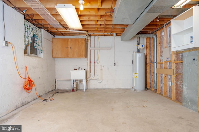 84 Transverse Unit 84, Middle River, MD 21220 - unfinished basement with water heater and concrete block wall