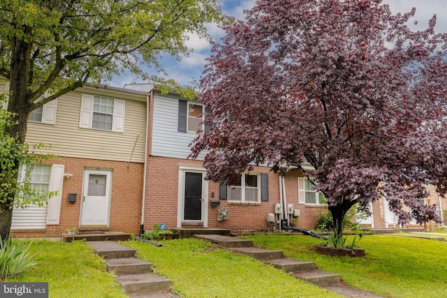 84 Transverse Unit 84, Middle River, MD 21220 - multi unit property with a front yard, brick siding, and entry steps