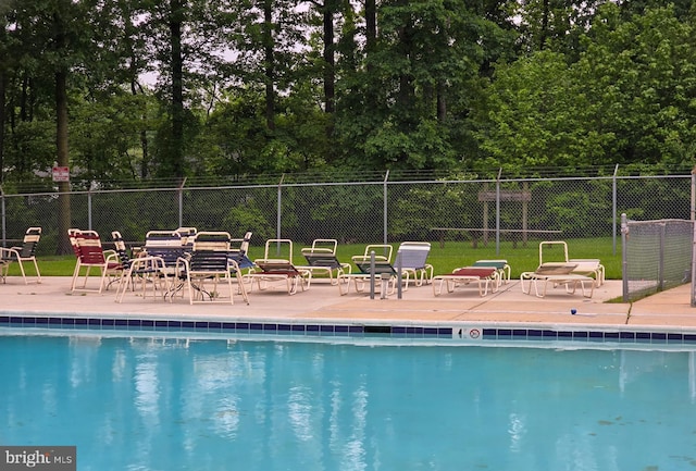 84 Transverse Unit 84, Middle River, MD 21220 - community pool featuring fence and a patio area
