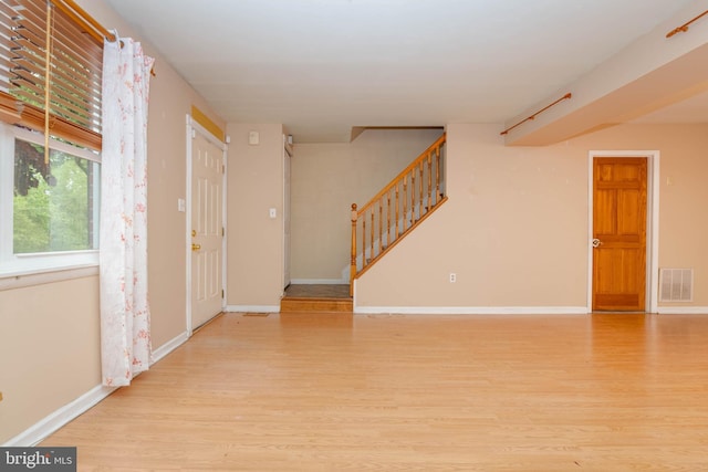 84 Transverse Unit 84, Middle River, MD 21220 - entrance foyer featuring wood finished floors, stairs, and baseboards