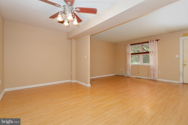 84 Transverse Unit 84, Middle River, MD 21220 - empty room with light wood-style flooring, baseboards, and a ceiling fan