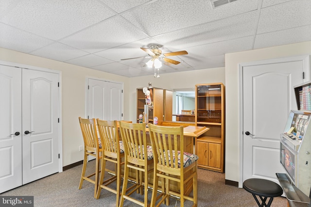 3547 Green Spring Rd, Havre De Grace, MD 21078 - carpeted dining space featuring a ceiling fan, a drop ceiling, and baseboards