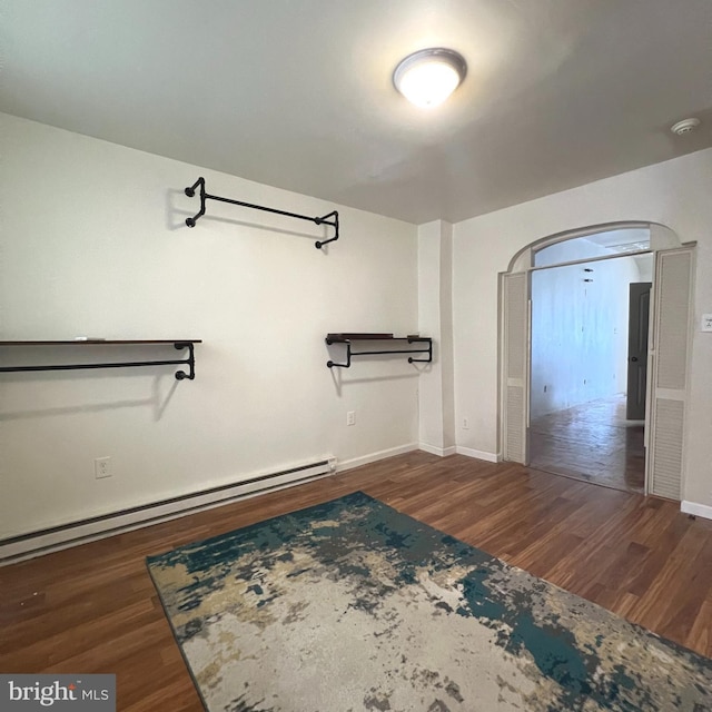 2947 W Girard Ave, Philadelphia, PA 19130 - walk in closet with a baseboard heating unit and wood finished floors