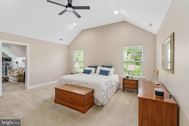 bedroom featuring light colored carpet, multiple windows, lofted ceiling, baseboards, and recessed lighting