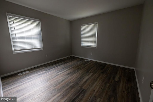 19 Rittenhouse Dr, Willingboro, NJ 08046 - spare room featuring dark wood-style flooring and baseboards