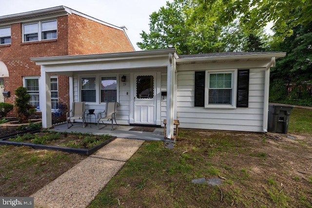 19 Rittenhouse Dr, Willingboro, NJ 08046 - view of front of house with covered porch and brick siding