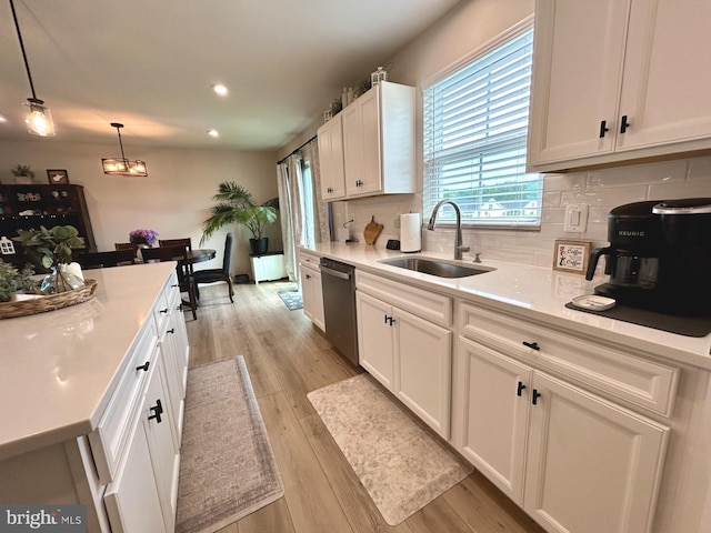 17 Perspective Pl, Hedgesville, WV 25427 - kitchen featuring a sink, dishwasher, white cabinets, tasteful backsplash, and recessed lighting