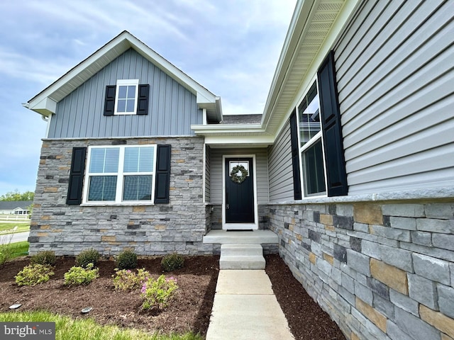 17 Perspective Pl, Hedgesville, WV 25427 - property entrance with stone siding and board and batten siding