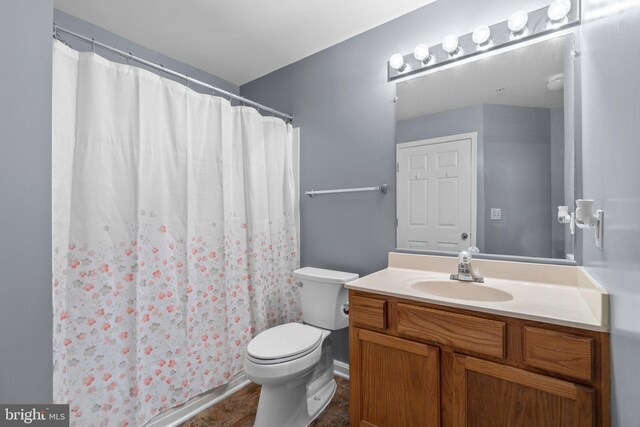 9150 Gracious End Ct Unit 104, Columbia, MD 21046 - full bathroom featuring toilet, vanity, and curtained shower