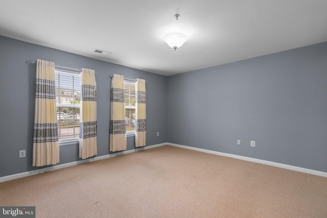 9150 Gracious End Ct Unit 104, Columbia, MD 21046 - unfurnished room featuring carpet, baseboards, and a pendent fire sprinkler