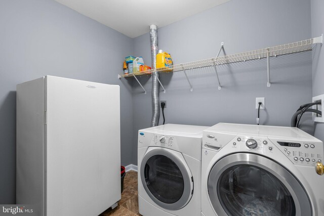 9150 Gracious End Ct Unit 104, Columbia, MD 21046 - laundry area with washer and dryer