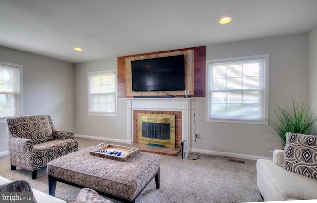 24 Edgewater Ln, Willingboro, NJ 08046 - carpeted living room with a brick fireplace, baseboards, and recessed lighting