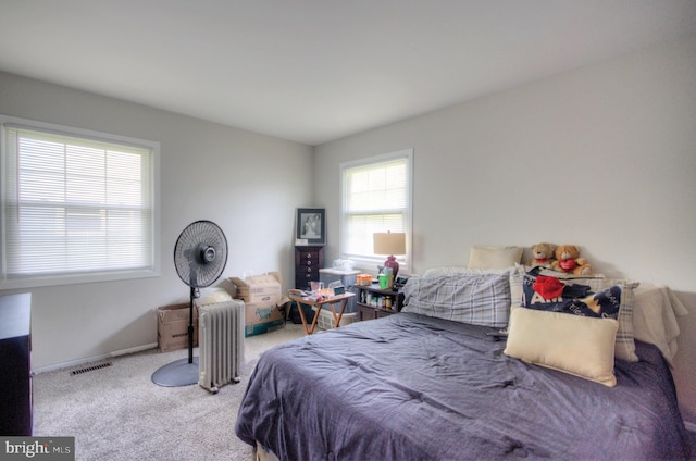 24 Edgewater Ln, Willingboro, NJ 08046 - carpeted bedroom with radiator heating unit and baseboards