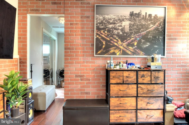 24 Edgewater Ln, Willingboro, NJ 08046 - detailed view of wood finished floors and brick wall