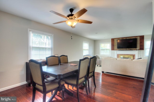 24 Edgewater Ln, Willingboro, NJ 08046 - dining area featuring dark wood-style floors, a ceiling fan, and baseboards