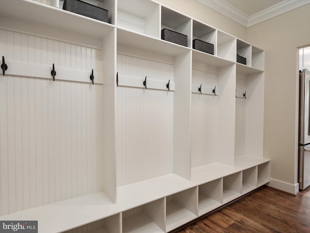 827 Janice Dr, Annapolis, MD 21403 - mudroom with ornamental molding, dark wood-style flooring, and baseboards