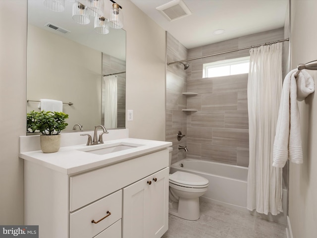 827 Janice Dr, Annapolis, MD 21403 - bathroom featuring shower / bath combination with curtain, vanity, toilet, and tile patterned flooring