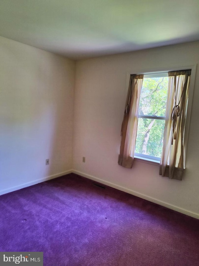 576 Kelker St, Oberlin, PA 17113 - unfurnished room with baseboards and dark colored carpet