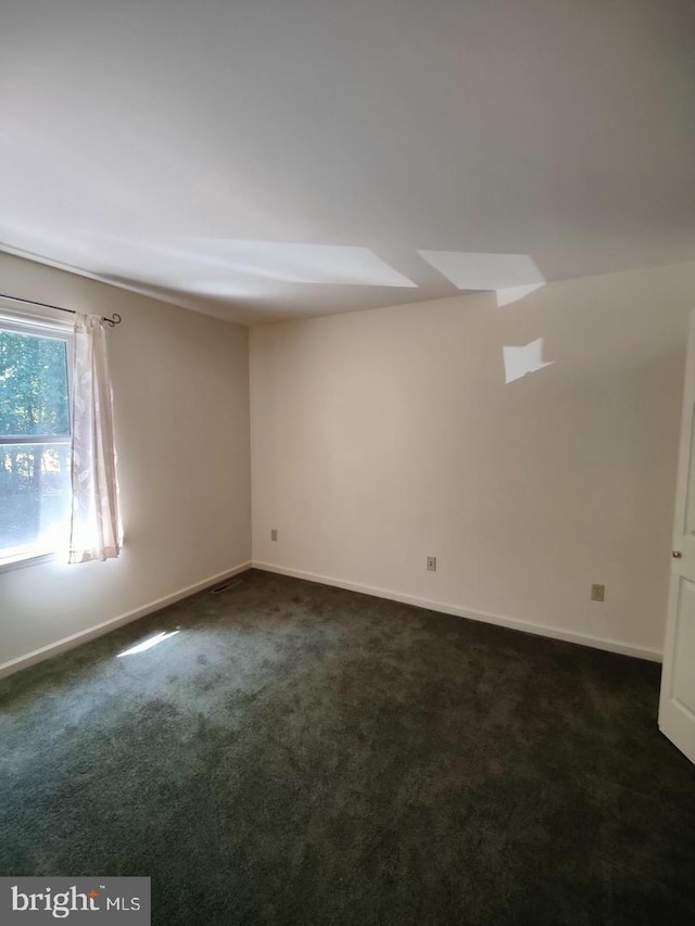 576 Kelker St, Oberlin, PA 17113 - spare room featuring dark carpet and baseboards