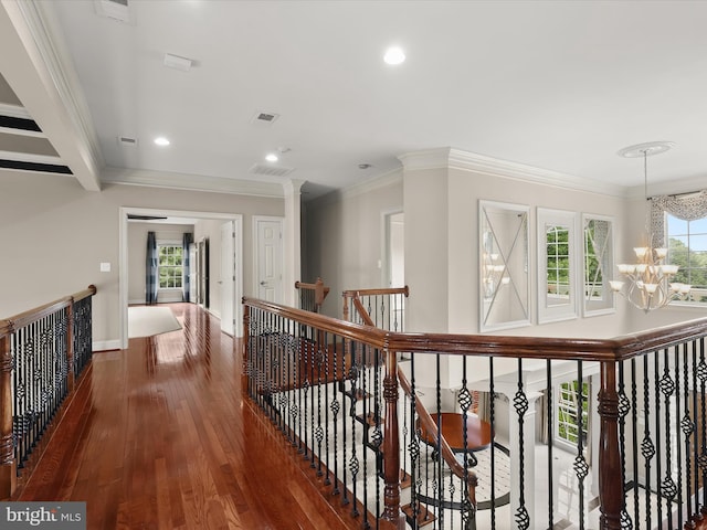 12810 Macbeth Farm Ln, Clarksville, MD 21029 - hall with a chandelier, an upstairs landing, dark wood-style flooring, ornamental molding, and recessed lighting