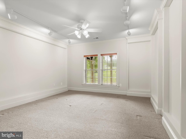 12810 Macbeth Farm Ln, Clarksville, MD 21029 - spare room with track lighting, light carpet, crown molding, ceiling fan, and baseboards