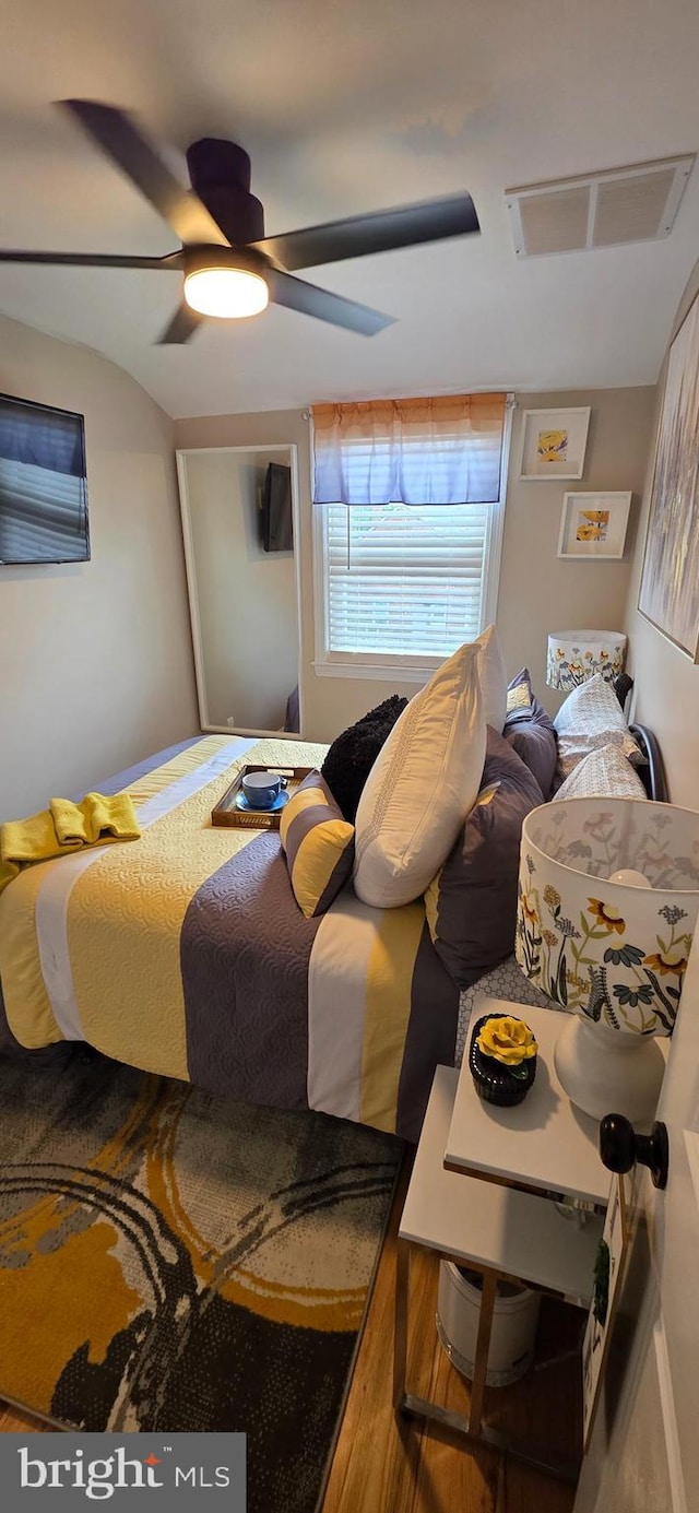 bedroom featuring ceiling fan and wood finished floors