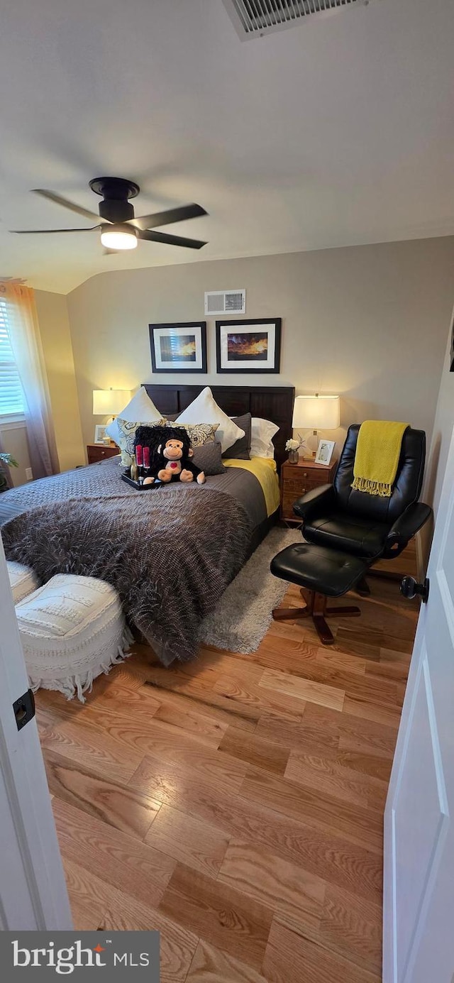 bedroom with wood finished floors and a ceiling fan