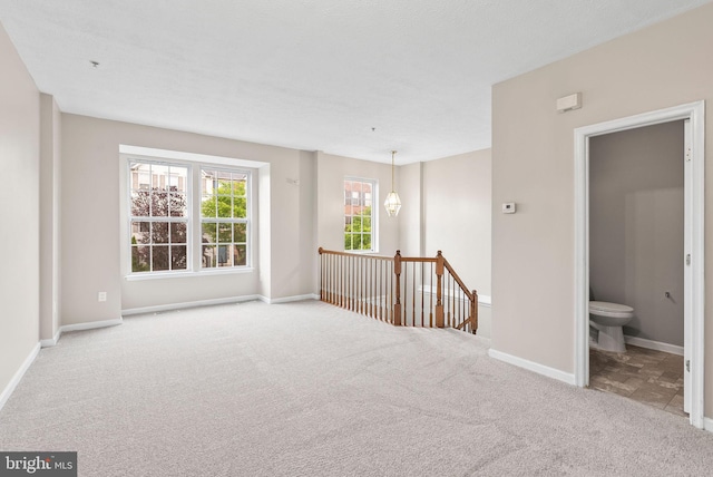 9711 Luguna Rd, Baltimore, MD 21220 - spare room featuring carpet and baseboards