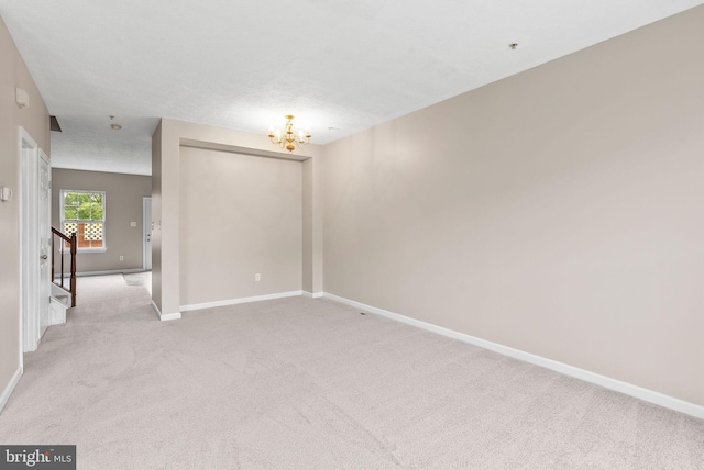 9711 Luguna Rd, Baltimore, MD 21220 - spare room with light carpet, a chandelier, baseboards, and stairs