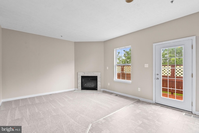 9711 Luguna Rd, Baltimore, MD 21220 - unfurnished living room featuring baseboards and a premium fireplace