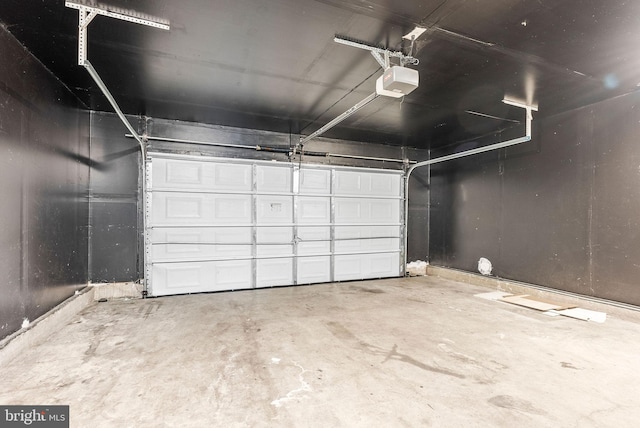 9711 Luguna Rd, Baltimore, MD 21220 - garage featuring a garage door opener