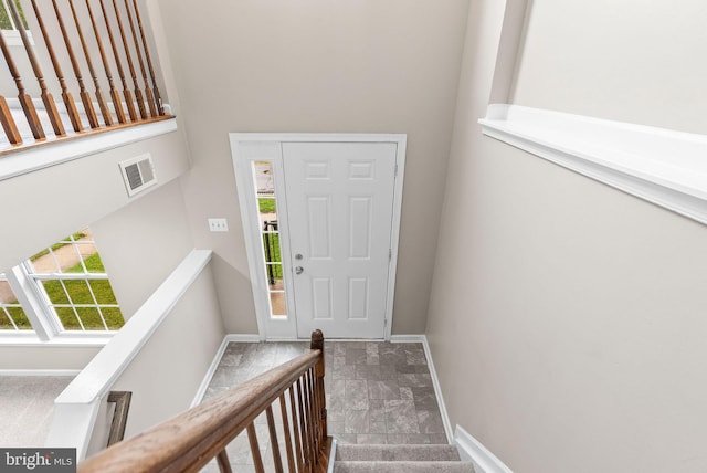 9711 Luguna Rd, Baltimore, MD 21220 - entryway featuring baseboards and stairway